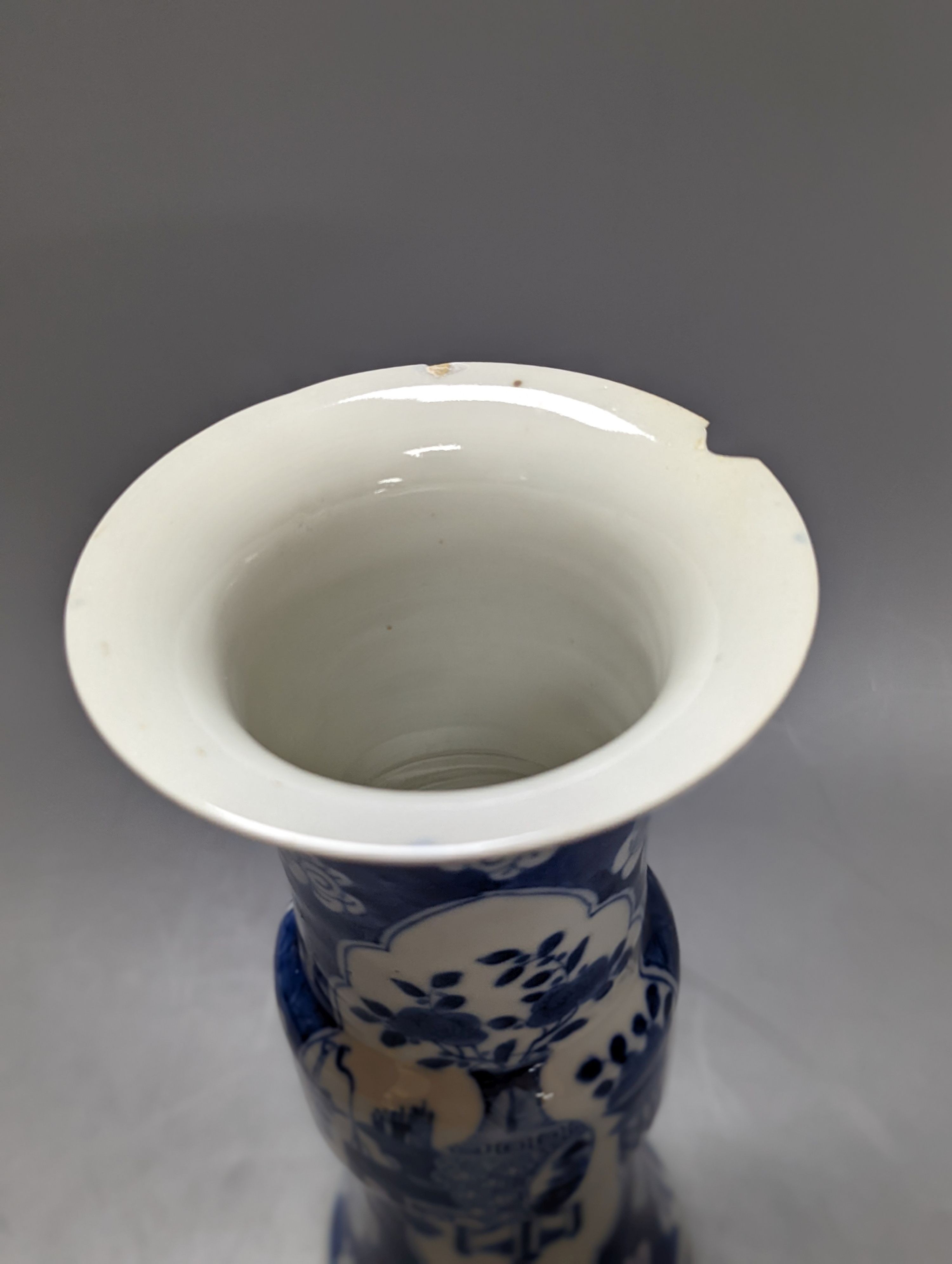 A 19th century Chinese blue and white prunus gu vase, 25 cms high.